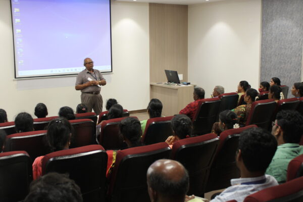 teacher in classroom giving lecture